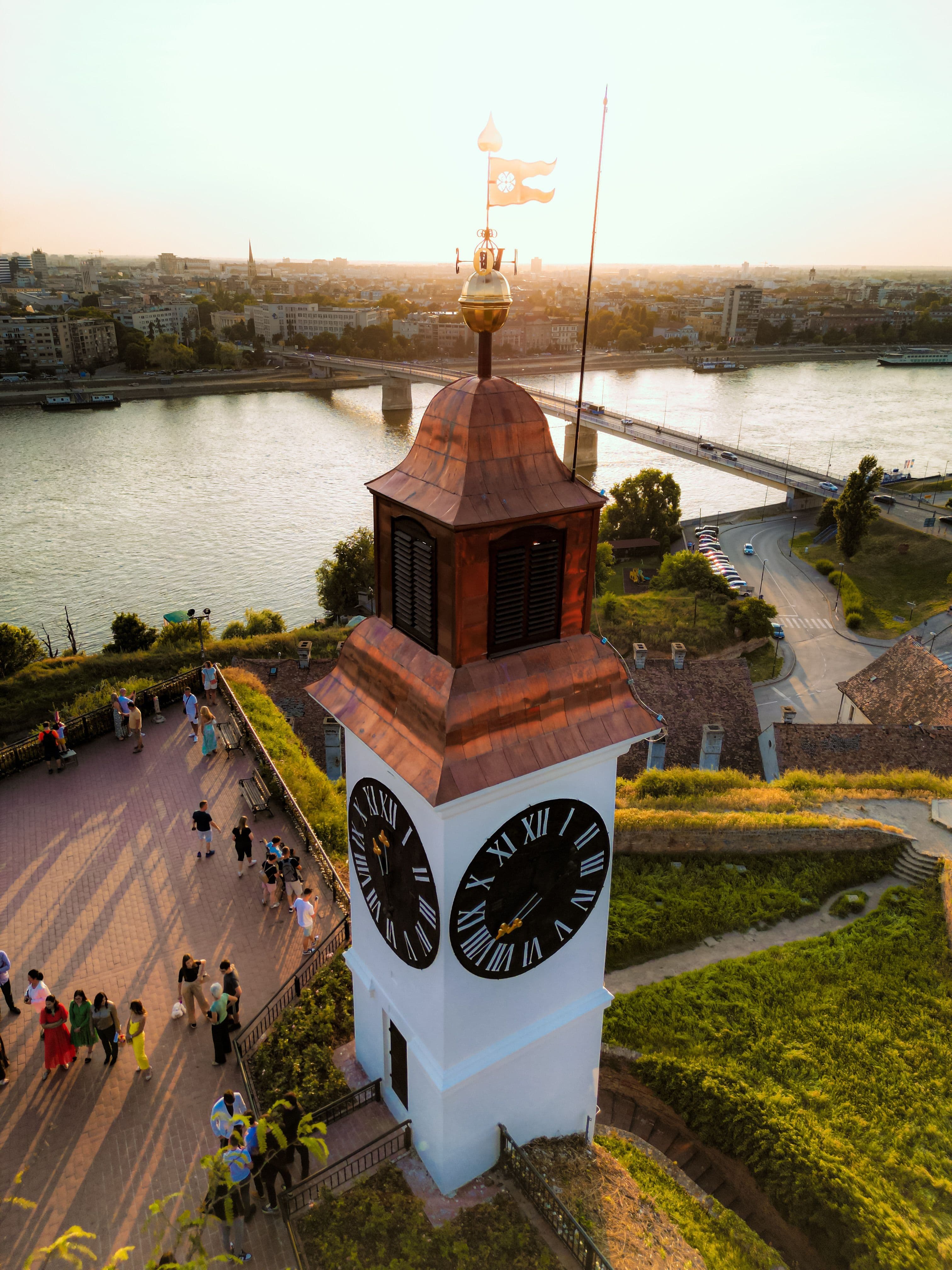 The clock tower of Petrovaradin Fortress above the Danube and Novi Sad